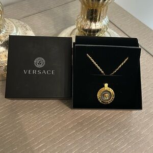 Versace necklace.